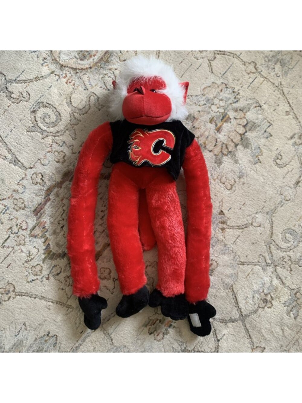 NHL Official Calgary Flames Red Slider Monkey Plush Grip Hands + Feet